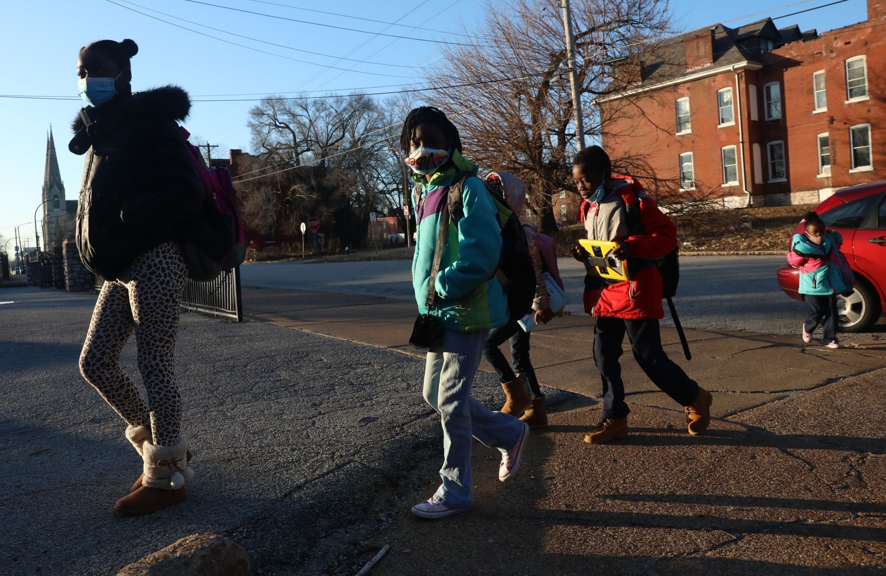 Destiny White leads her siblings into Clay Elementary